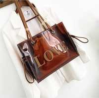 Sac fourre-tout transparent en PVC pour l'été, sac en gelée transparent tendance avec logo 'Love' cousu, grande capacité, intérieur en toile plastique, sacs à main pour femmes