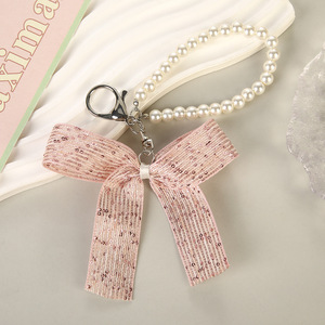 Llavero <span class=keywords><strong>de</strong></span> cadena <span class=keywords><strong>de</strong></span> perlas con lazo floral pequeño estilo coreano, set <span class=keywords><strong>de</strong></span> regalo <span class=keywords><strong>de</strong></span> 8 llaveros elegantes con lazo, dijes <span class=keywords><strong>de</strong></span> cadena <span class=keywords><strong>de</strong></span> perlas virales <span class=keywords><strong>de</strong></span> TikTok para bolsos - Product Image 3
