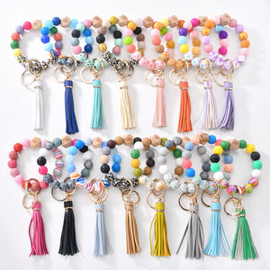 <span class=keywords><strong>Bracelet</strong></span> en <span class=keywords><strong>silicone</strong></span> coloré porte-clés portefeuille pour femmes porte-clés <span class=keywords><strong>bracelet</strong></span> perles porte-clés à pampilles - Product Image 1