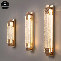 Applique murale moderne en acrylique à LED Lampe de chevet en cristal avec aluminium pour la décoration de la maison du salon