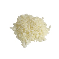 Adhésif thermofusible EVA granule jaune colle thermofusible à réglage rapide pour l'étanchéité de la boîte