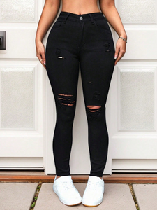 Jeans ajustados de cintura alta para mujer, estilo urbano chic, color negro sólido, con rotos, para uso diario. - Product Image 3