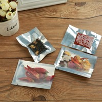 Sacs sous vide personnalisés en usine, transparents à l'avant et aluminisés à l'arrière, pour bonbons, noix, emballage alimentaire, sacs en plastique et aluminium pour aliments