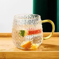 Tasse en verre sculpté transparent à rayures verticales avec poignée pour boire de l'eau lait café vin tasse en verre gaufré