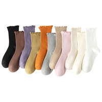 Chaussettes empilées mi-tube en coton confortables pour le printemps et l'automne Chaussettes filetées à bord en bois doux