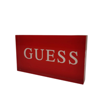 Blocs publicitaires personnalisés en acrylique rouge avec logo de marque DNY et lettres blanches, fabriqués à Guangdong