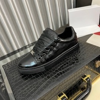 Chaussures de sport basses pour hommes Paris Trendy, style décontracté et professionnel, en cuir plissé noir, blanc, rouge, classiques pour Martin