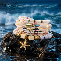 RINHOO Ensemble de bracelets tressés bohèmes en coquillages et perles pour femme, style plage, avec étoiles de mer et perles de riz, bijoux pour fêtes et vacances