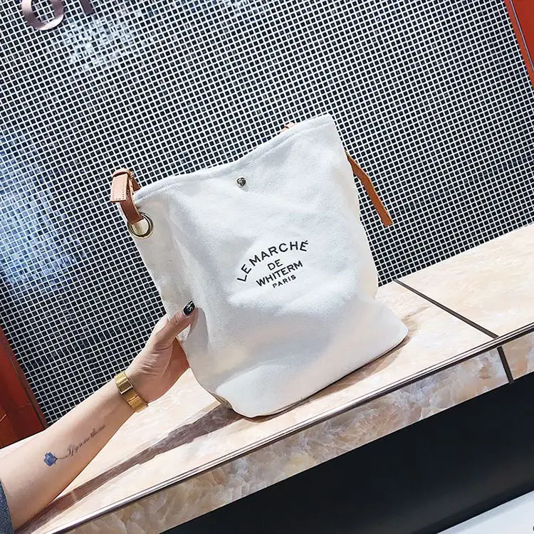 Fashion Design di alta qualità Logo personalizzato colore Eco Friendly Shopper borse a tracolla in tela di cotone con manici in pelle marrone