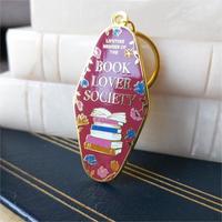 Fabricante Venta caliente suave esmalte llavero libro amante sociedad llavero decorativo personalizado dibujos animados colgante esmalte llaveros