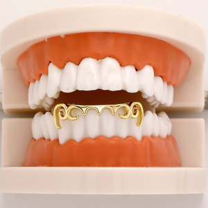 Grillz para dientes con diseño de estrellas en oro y plata, para fiestas, unisex, estilo hip hop. - Product Image 3