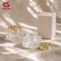 Pot en verre carré rechargeable de 200 ml (avec couvercle doré) adapté aux crèmes pour le visage, aux crèmes pour le corps et aux beurres corporels, logo personnalisé