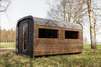Runde Mobile Sauna-Kabine |   Verkohlte Holzverkleidung, Asphaltschindeldach & Holzofen-Schornstein |   Für 4-6 Personen geeignet