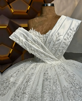 Robe de mariée de luxe élégante 2026 en dentelle perlée, coupe princesse, épaules dénudées, asymétrique, col en V, scintillante, pour mariées africaines