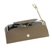 Étui à lunettes minimaliste en cuir véritable avec breloque, pochette suspendue à bouton-pression, support de lunettes portable et élégant