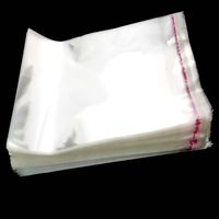 Emballage cadeau personnalisé en plastique transparent PE & PO Sac Opp adhésif dépouillé Type de sac sous vide