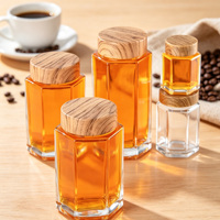 Vente en gros usine : Bouteilles de miel hexagonales avec couvercle imitation bois, Bouteilles en verre, Bocaux scellés, Bocaux à confiture et Bouteilles pour conserves