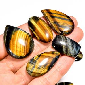 Cabochon de pierres précieuses naturelles multicolores naturelles en vrac Oeil de tigre naturel pour la fabrication de bijoux en Inde Oeil de tigre - Product Image 1