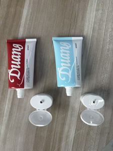 หลอดเครื่องสำอางแบบฝาพับสีแดงและสีฟ้าอ่อนกำหนดเอง OEM ODM สำหรับผลิตภัณฑ์ดูแลผิวพิมพ์ <span class=keywords><strong>duang</strong></span> และบรรจุภัณฑ์รองพื้น - Product Image 5