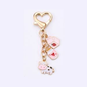 Nouveau porte-clés en alliage de zinc doré en forme de cœur pour animaux de compagnie, petit pendentif vache, accessoire de sac - Product Image 2