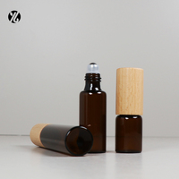 Flacon roll-on en verre ambré écologique avec couvercle en bambou, flacon vide pour huiles essentielles et cosmétiques, estampé or, sérigraphié