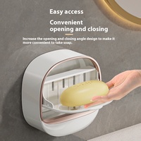 Porte-savon mural moderne et élégant, best-seller, boîte de rangement à savon pliable de luxe avec design de drainage et boucle adhésive