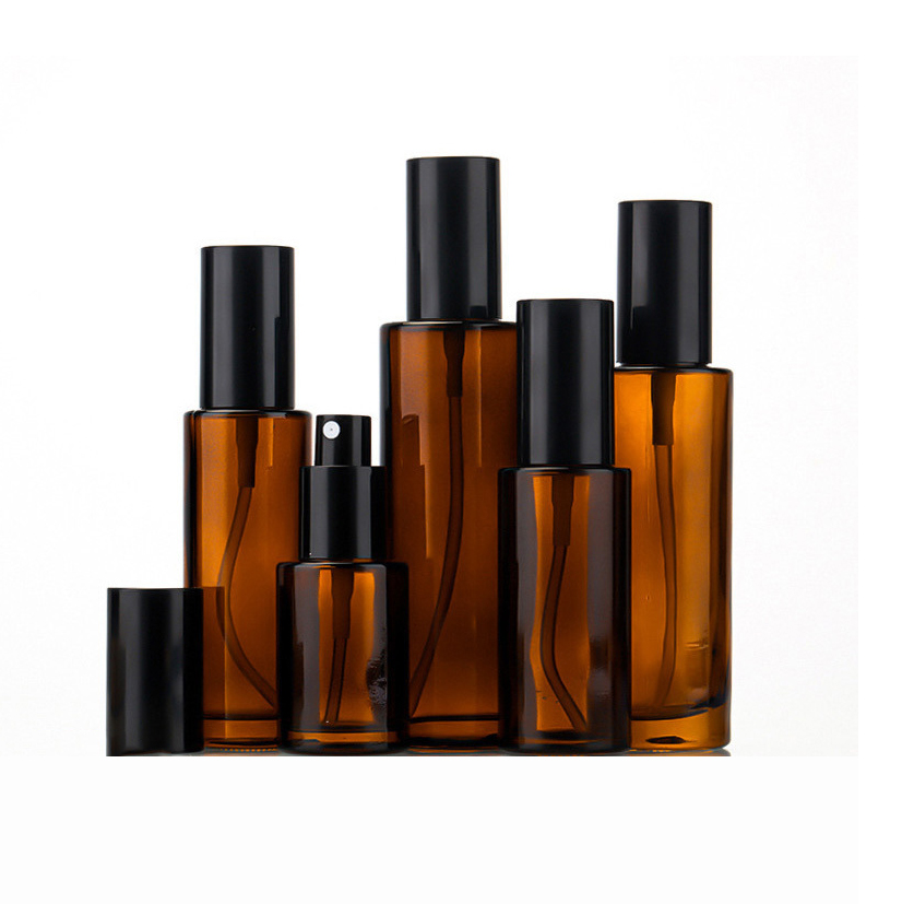 Botella de vidrio ámbar con pulverizador de niebla fina