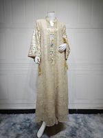 Robe longue musulmane de luxe vert menthe 2026 de Dubaï, broderie florale, sequins, col mandarin, manches cloche avec pompons, tenue modeste