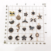 Breloques en émail noir pour la fabrication de bijoux DIY, pendentifs en alliage plaqué or, coquillage, chat, papillon, sirène, étoile, 31 styles