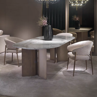 Chaise de salle à manger mobile en laine d'agneau, style italien moderne, simple, luxe léger, accoudoirs en tissu, dossier décontracté, acier au carbone