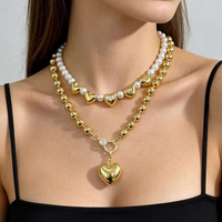 Collier tendance plaqué or avec pendentif cœur en coquillage CH-HDN2263, collier avec pendentif cœur et perles en cuivre, collier à fermoir cœur avec perles