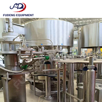 Machine de remplissage de liquides à pompe à engrenages multi-têtes d'occasion pour eau, jus, lait, vin, bière, sauce, en acier inoxydable, à bas prix, en stock