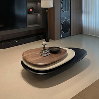 Ensemble de tables basses gigognes modernes avec finition peinte en placage de bois, meubles contemporains ovales pour salon