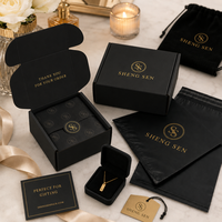 Boîtes d'emballage en papier noir compostable ondulé personnalisées avec logo personnalisé pour l'expédition de vêtements avec logo