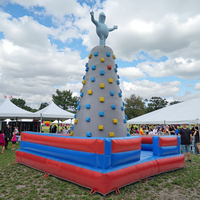 Mur d'escalade gonflable imperméable de qualité supérieure, idéal pour les événements sportifs, les fêtes et les activités de team building, disponible à la location