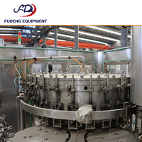 Machine de remplissage automatique polyvalente pour différentes tailles de bouteilles, remplisseuse linéaire par gravité avec réglage facile du volume