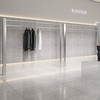 Porte-vêtements rotatif en acier inoxydable, style luxe léger, pour boutique de vêtements
