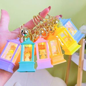 Creative Small LED Light Quicksand Oil Lighthouse Oil <b>Key</b> <b>Chains</b> with Light Bag Pendant Acrylic Lighthouse Liquid Keychain - Product Image 3