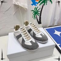 Nouvelle tendance sportive à la mode chaussures décontractées baskets haut de gamme en cuir véritable souple unisexe anti-dérapant printemps chaussures de voyage quotidiennes