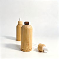 Flacon compte-gouttes en verre ambré enveloppé de bambou rechargeable pour huile essentielle, sérum, emballage cosmétique