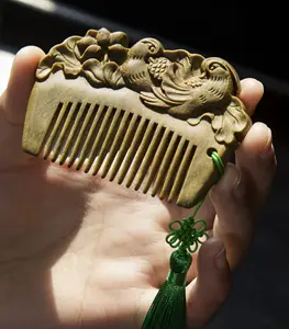 Custom hand carved gift cartoon portable sandalwood comb mini comb baby comb solid wood carding products processing wholesale