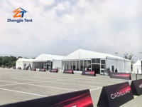 Tente d'exposition automobile, structure en aluminium, couverture en PVC, abri imperméable, ignifuge et durable pour promotion automobile en extérieur