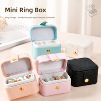 Boîte à bijoux de voyage ovale mini en cuir PU de luxe, personnalisable avec logo et bouton, pour bagues et boucles d'oreilles, vente en gros