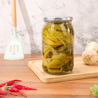 Stoples kaca bening bundar 850ml dengan label khusus dan tutup logam putar warna perak untuk pengalengan dan penyimpanan makanan