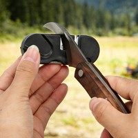 Couteau de chasse professionnel pliable, petit, noir, avec aiguiseur multi-grains double face, écologique, avec tige d'affûtage recouverte de sable