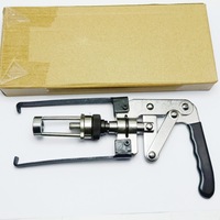Outil universel de dépose et de compression des ressorts de soupape, et de retenue des joints de tige de soupape pour moteur