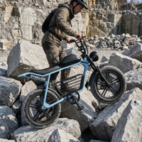 Vélo électrique tout-terrain robuste pour adultes avec suspension, pneus larges, idéal pour la pratique hors route sur les chemins de gravier