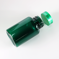 Bouteilles en plastique PET vertes de 100 ml avec bouchon à vis, sérigraphiées, vides, pour capsules, pilules, vitamines et compléments alimentaires