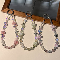 Chaîne de téléphone en alliage avec papillon, cristal et camélia, porte-clés lumineux en forme de rose, breloque pour sac et écouteurs, bijou fantaisie, cadeau, vente en gros
