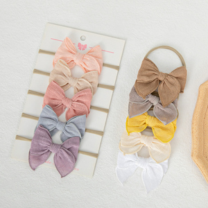 女婴棉麻迷你寓言蝴蝶结头带甜美柔和颜色弹性尼龙发带新生儿发饰 - Product Image 1